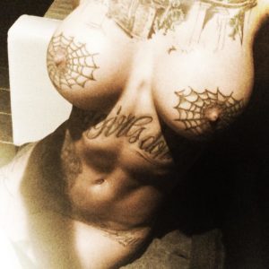 hot pic of bonnie rotten naked showing off her tats