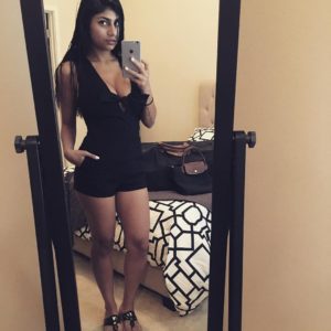 Mia Khalifa short black dress bedroom selfie