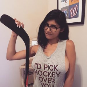 lebanese porn star mia khalifa holding a hockey stick and looking sexy
