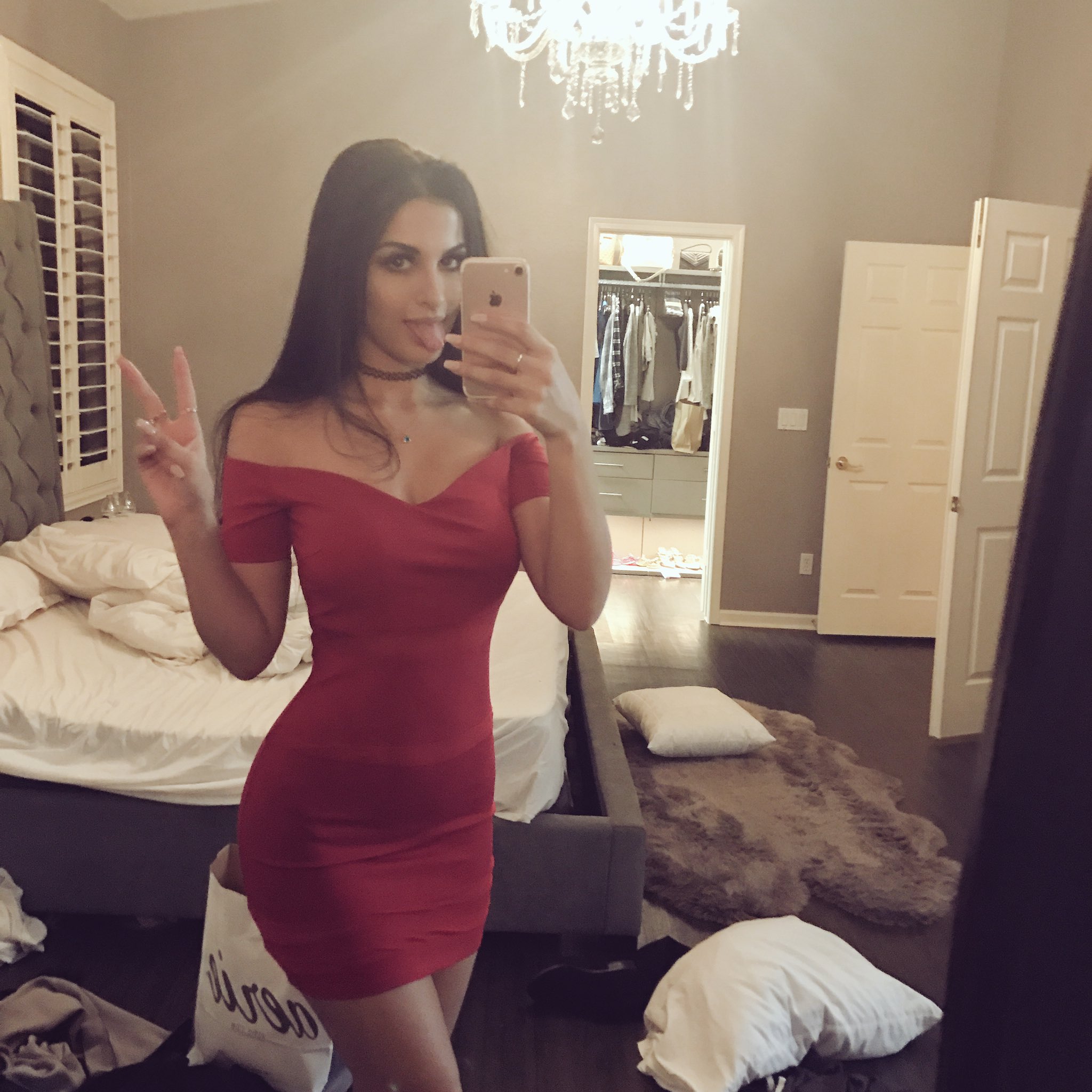 hot youtuber sssniperwolf in tiny red dress taking a naughty selfie