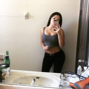 mirror pic of genesis showing off her curves