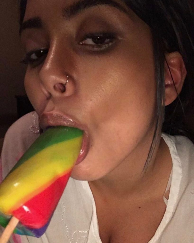 Aaliyah Hadid sucking on a popsicle